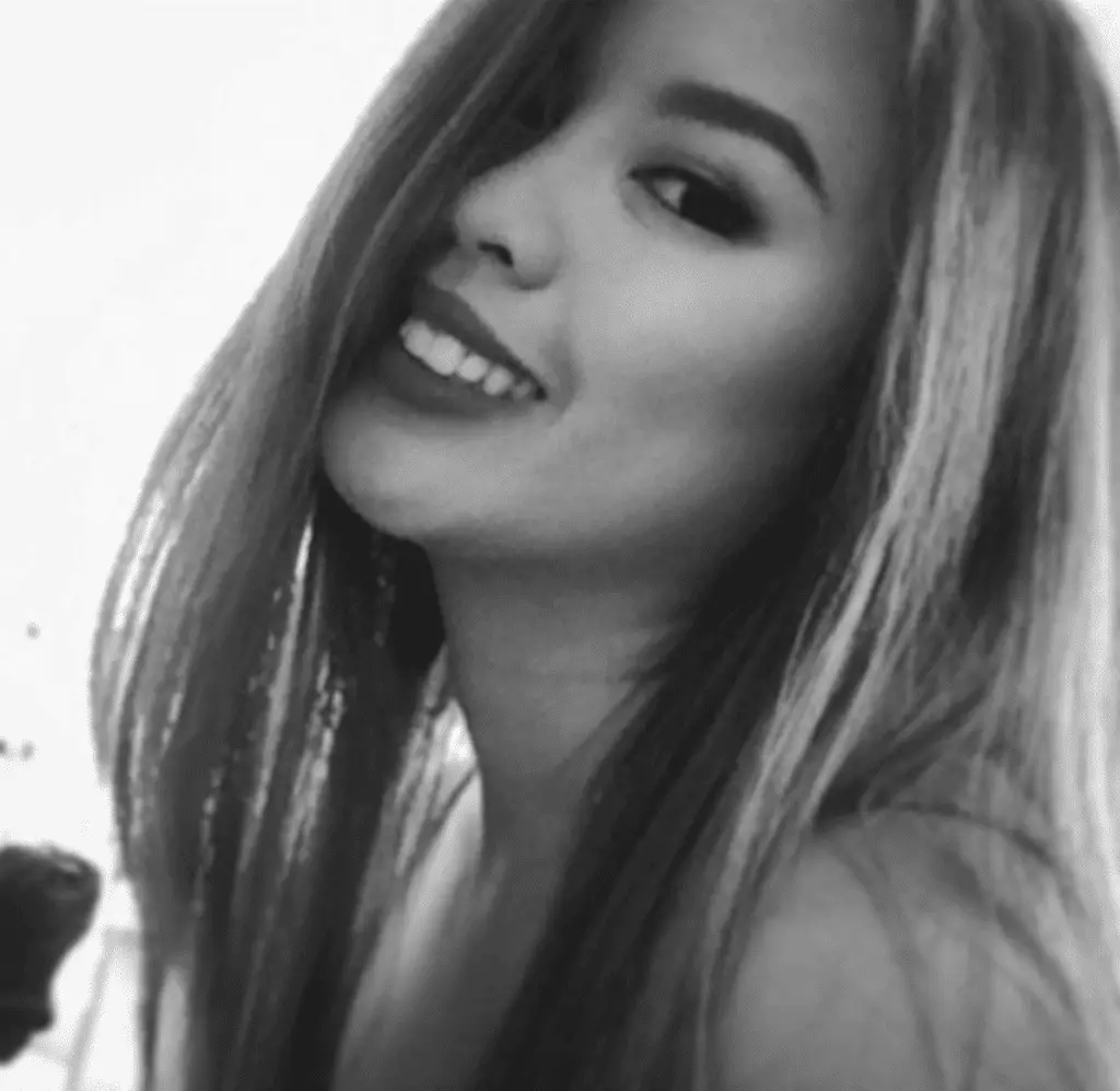 Smiling woman in black and white photo